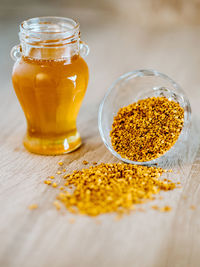 Close-up of beer in glass jar on table