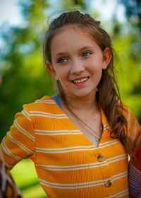 Portrait of smiling young lady.