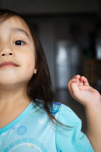 Portrait of an asian toddler, 3 years old. cheeerful, joyful and full of confidence.