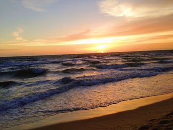 Scenic view of sea at sunset