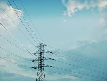 Low angle view of electricity pylon