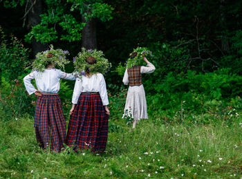 People on grass in garden