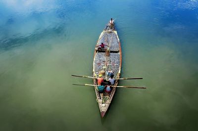 High angle view of people on boat in lake