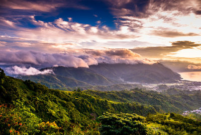 Scenic view of mountains against sky during sunset