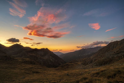 Scenic view of mountains against sky during sunset