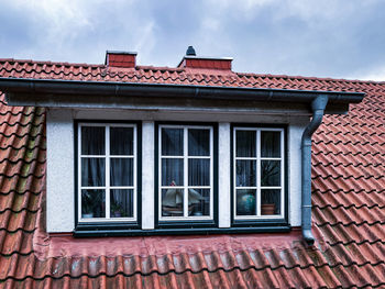 The exterior of the house against the sky