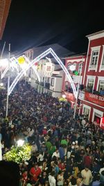 Crowd in illuminated building