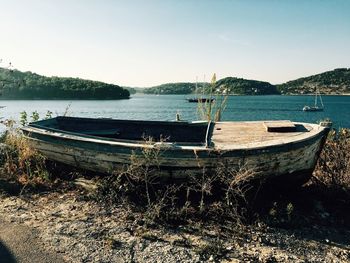 Boats moored in lake