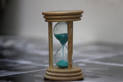Close-up of clock on table