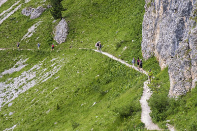 High angle view of people on rocks