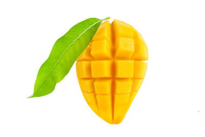 Close-up of mango against white background