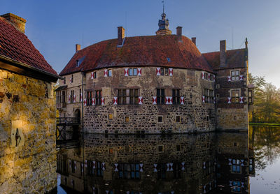 Low angle view of castle vischering  against sky