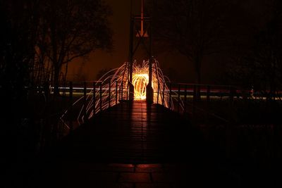 Illuminated street light at night