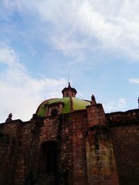 Low angle view of temple against sky