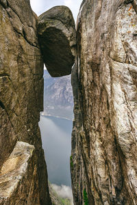 Low angle view of rock formation against sky