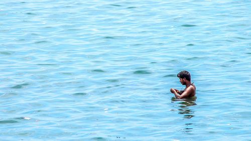 People enjoying in sea