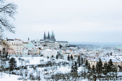 Cityscape of winter prague under snow