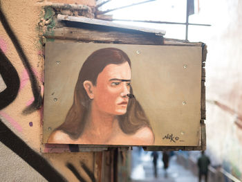 Portrait of young woman looking away