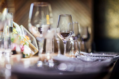 Luxury table settings for fine dining with and glassware, pouring wine to glass. 