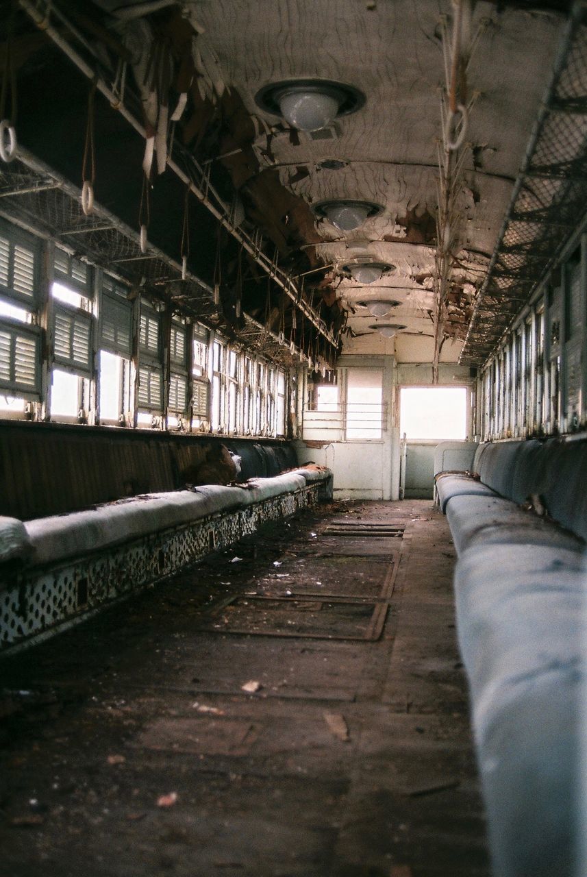 abandoned, indoors, no people, architecture, obsolete, ceiling, absence, built structure, building, day, window, old, damaged, run-down, decline, deterioration, in a row, empty, industry, messy, ruined