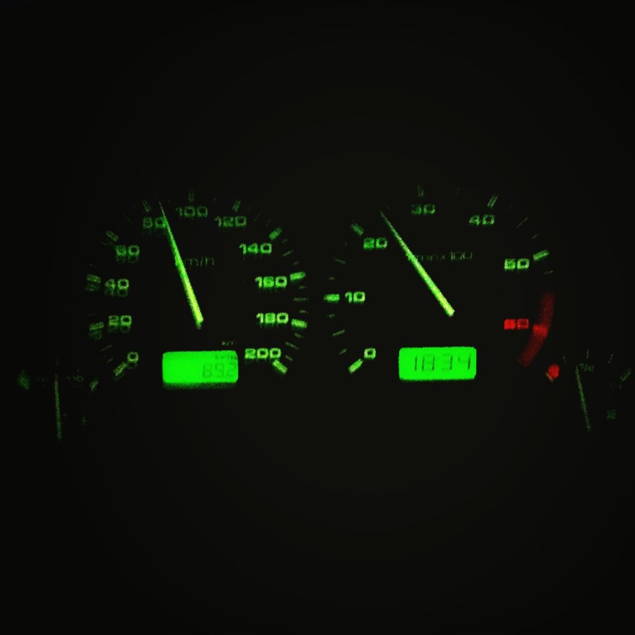 transportation, night, illuminated, communication, text, mode of transport, vehicle interior, green color, indoors, land vehicle, car, western script, guidance, number, travel, dark, close-up, information sign, no people, direction