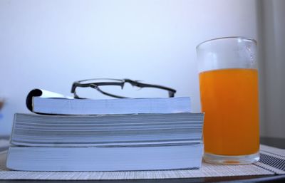 Close-up of beer glass on table