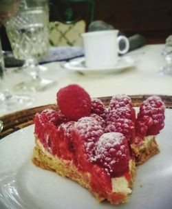 Close-up of strawberries in plate on table