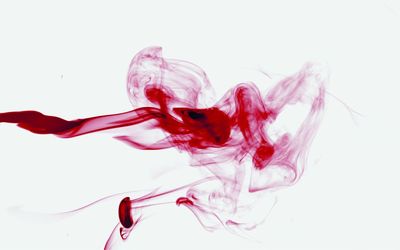 Close-up of light painting against black background