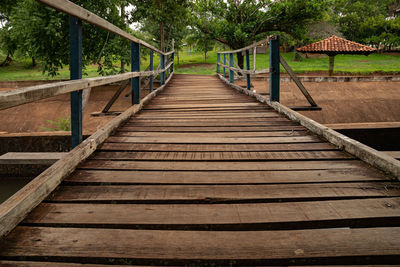 Wooden footbridge on footpath