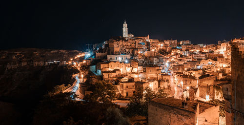 Buildings in city at night