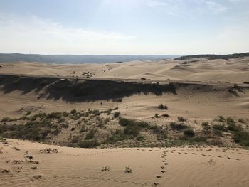 Scenic view of desert against sky