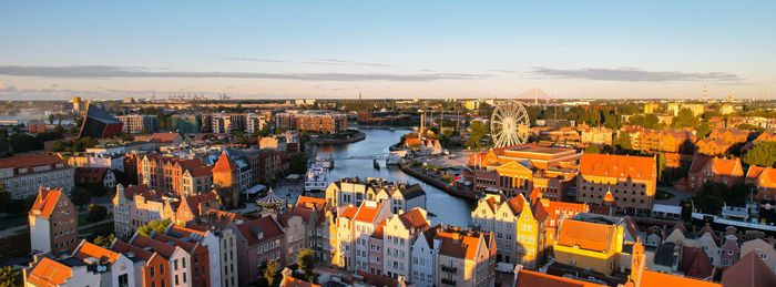 Beautiful architecture of old town in gdansk, poland at sunny day. panorama banner size aerial view