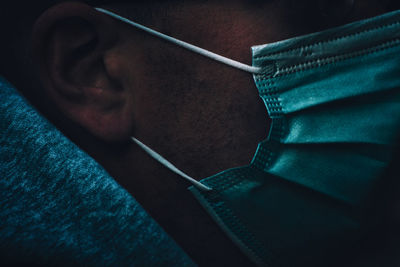 Close-up of man wearing hat