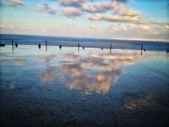 Scenic view of beach against sky