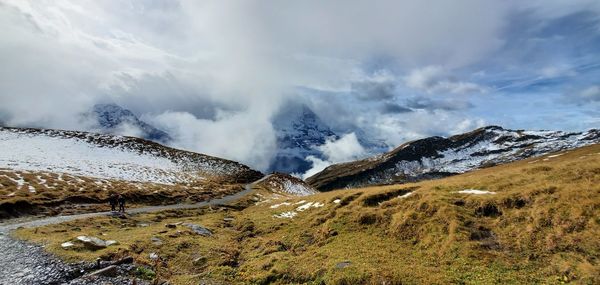 Scenic view of snowcapped mountains against sky