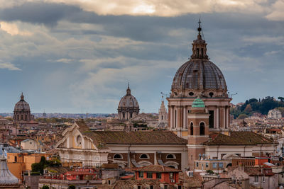 High angle view of buildings in city against sky