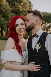 Young couple standing outdoors