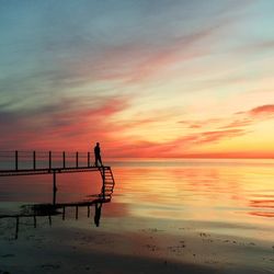 Scenic view of sea at sunset