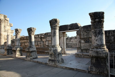 Ruins of historical building against clear sky