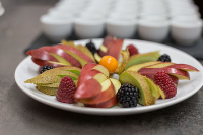 Close-up of fruits in plate