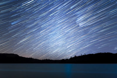 Scenic view of star field against sky at night