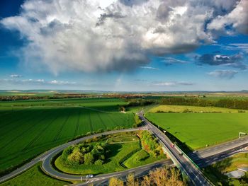 Aerial view of agricultural landscape against sky