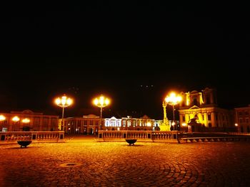 View of illuminated buildings at night
