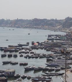 High angle view of boats moored in harbor