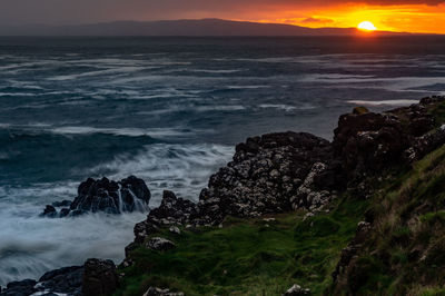 Scenic view of sea against sky during sunset