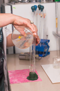 Close-up of hand holding glass