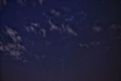 Low angle view of stars in sky at night