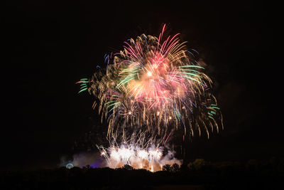 Low angle view of firework display