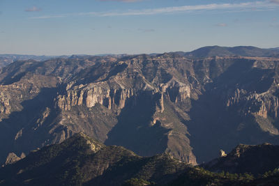 Scenic view of rocky mountains against sky on copper canyon / barrancas del cobre