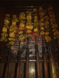 High angle view of vegetables on barbecue grill